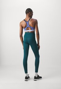 Under Armour HIGH - Sujetadores deportivos con sujeción alta - starlight/black/celeste
