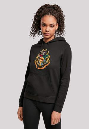 Black hooded sweatshirt featuring a Hogwarts crest in vibrant colors, kangaroo pocket, and textured fabric. Casual fit with ribbed cuffs.