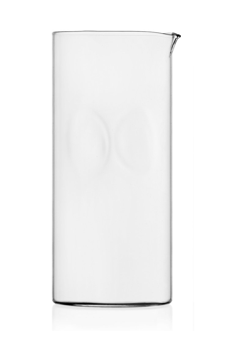 Przezroczysty szklany zlew o cylindrycznym kształcie, z wylewem i gładką powierzchnią. Charakteryzuje się minimalistycznym designem i wyraźnym zaokrągleniem do pomiarów.