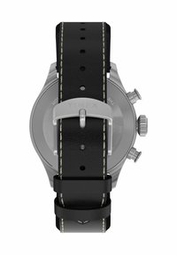 Roostevabast terasest Timex kell, mille tagaküljel on must nahast rihm, kreemivärvi õmblused, pandla sulgemine ja paremal nähtavad kaks külgnuppu.