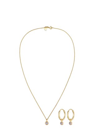 Gold-tone jewelry set featuring a delicate chain necklace with a round pendant and matching hoop earrings, each adorned with a small stone.