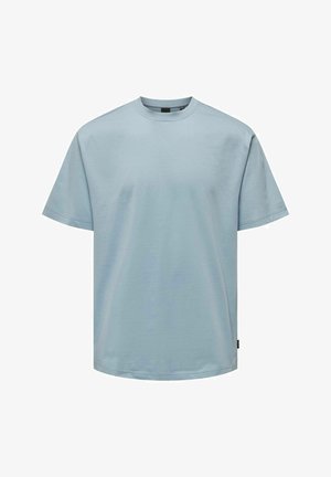 Light blue cotton t-shirt with a crew neckline, short sleeves, and a relaxed fit. Features a straight hem and minimalistic design.