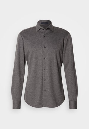 Gray long-sleeve shirt made of soft fabric with a button-down front, black buttons, and a classic collar. Features a curved hem.