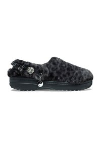 Fuzzy black slippers with a leopard print texture, featuring a thick black sole, decorative bow, and a yin-yang charm on the side.