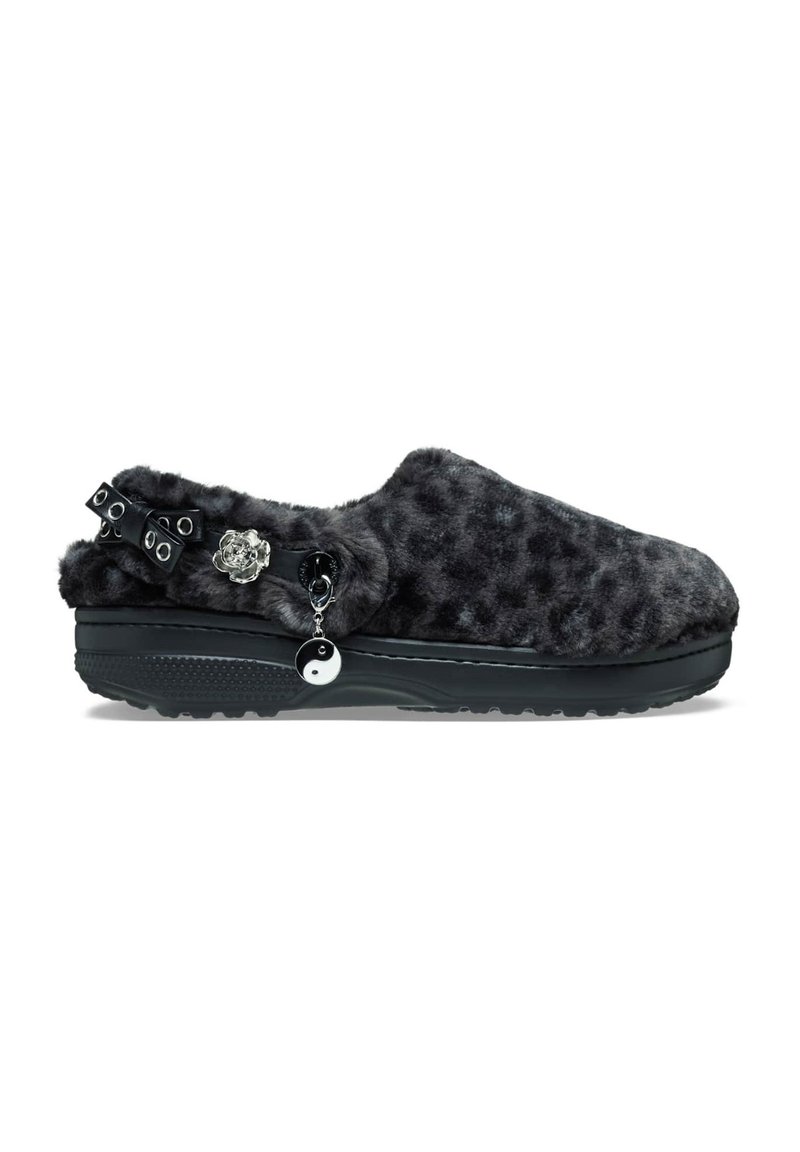 Fuzzy black slippers with a leopard print texture, featuring a thick black sole, decorative bow, and a yin-yang charm on the side.