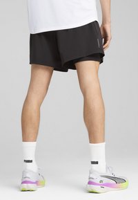 Puma RUN VELOCITY SHORT - Sports shorts - black