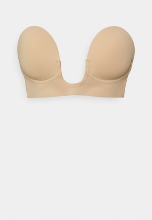 Nackter, trägerloser BH mit glatter Textur, runden Cups und mittigem Ausschnitt. Verfügt über ein nahtloses Design und minimalen Hardwareeinsatz für diskreten Tragekomfort.