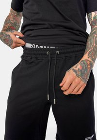 Sixth June ESSENTIEL - Pantalones deportivos - black