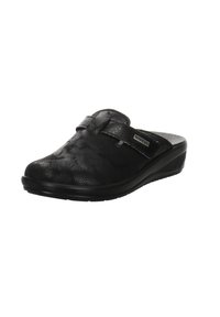 Sort træsko i klipstyle med tekstureret materiale, slip-on design, justerbar rem og kilehælsåler for ekstra højde. Glat inderside.