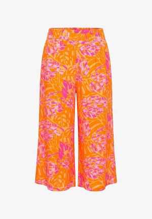 Weit geschnittene, verkürzte Hose mit elastischem Bund, mit oranger Basis und leuchtend pinkem tropischem Blattmuster.