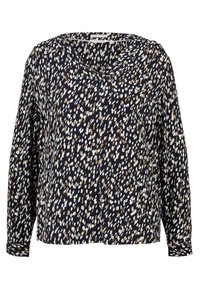 Blouse bleu marine avec un col en V, des manches longues et une coupe ample. Présente un motif à pois en blanc, beige et tons marron doux.