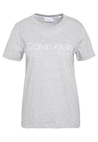 Camiseta de manga corta gris claro con cuello redondo y el logo de "Calvin Klein" en blanco centrado en el pecho.
