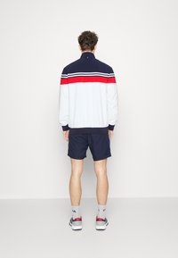 Fila BRUNO - Chaqueta de entrenamiento - white/red