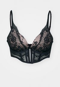 Soutien-gorge en dentelle noire avec une superposition transparente, présentant des motifs floraux, un support à armatures et un bas style bandeau avec des rayures verticales.