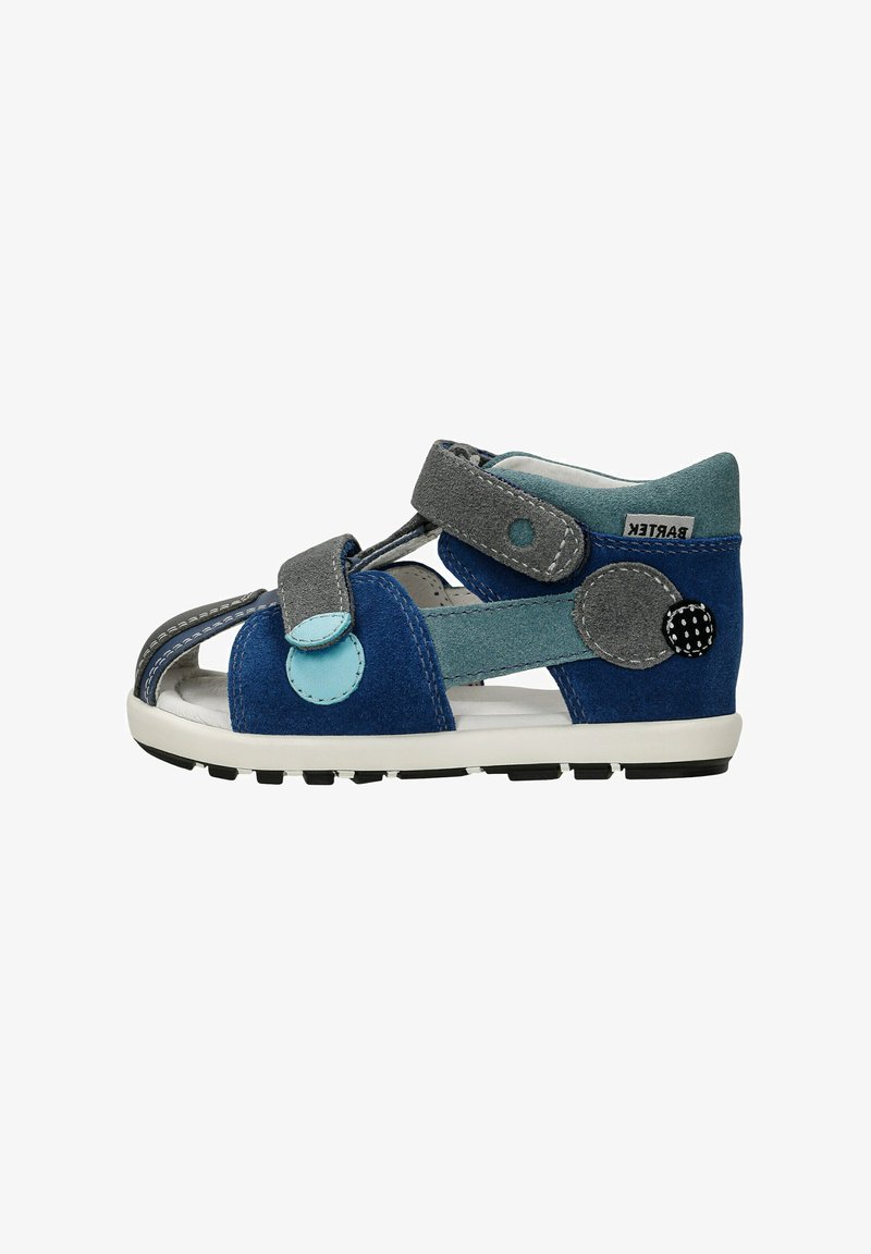 Children's blue and gray suede sandal with Velcro straps, rubber sole, and decorative circular appliques on a plain white background.