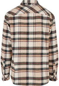 Rutete skjorte med knapp- ned krage, i beige, grønn og burgunder mønster. Laget av myk stoff, med lange ermer og knappebånd.