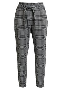 Černobílé kostkované kalhoty s páskem na stažení, zúženými nohavicemi a texturovanou tkaninou s kostkovaným vzorem.