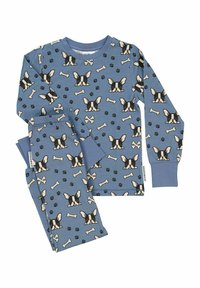 Blå pyjamas med ett mönster av svarta och vita hundansikten, ben och tassavtryck. Tillverkad av mjukt tyg med långa ärmar och byxor.