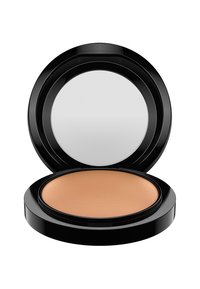 Rund kompakt med en svart utsida och en silverfärgad spegel inuti. Innehåller ett mjukt, ljust tan-puder med en matt finish.