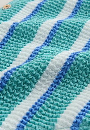 Woven textile featuring alternating stripes in turquoise, blue, and white. Textured surface with rippled patterns and a soft finish.