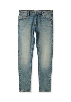 Jeans in denim blu con una vestibilità slim, caratterizzati da una parte anteriore scolorita, cuciture a contrasto, cinque tasche e chiusura con bottone.