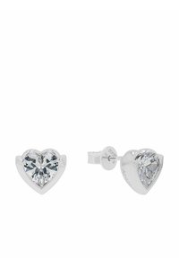 Hjärtförande örhängen med klara, facetterade stenar. En monterad i glänsande silverfärgad metall, med en säker bakfäste.