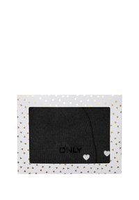 Black knit beanie set in a white box with gold hearts. Beanie features "ONLY" logo and silver heart details on the cuff.
