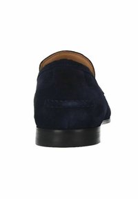 Navy blue suede loafers with a sleek design, rounded toe, and black rubber sole. Stitched detailing along the back adds texture.