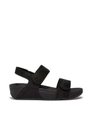 Sandali neri con cinture in velcro regolabili, tessuto testurizzato e suola imbottita. Presentano un design a zeppa bassa per comfort e stabilità.