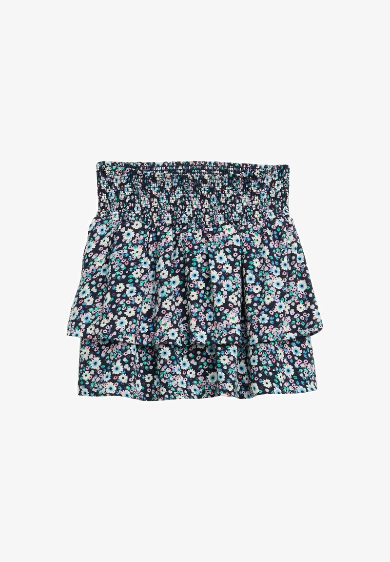 Bloemenrok met een gerimpelde taille, met een gelaagd ontwerp. Donker marineblauwe achtergrond met kleine blauwe, roze en witte bloemen verspreid.