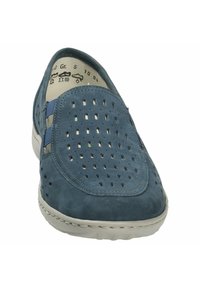 Blue suede slip-on shoe featuring perforated design, elastic side accents, and a light outsole. Interior displays size and care symbols.