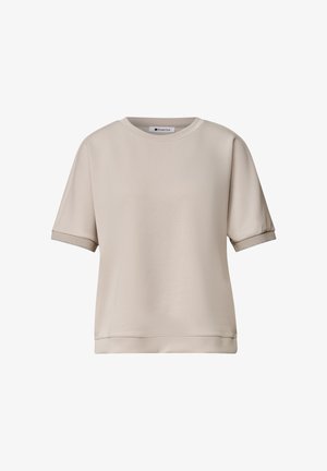 Camiseta beige de manga corta con cuello redondo, mangas con puños y dobladillo recto, mostrada sobre un fondo blanco.