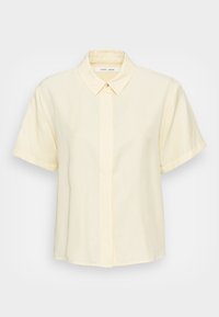 Chemise à manches courtes, jaune pâle, avec un col classique, une fermeture par boutons sur le devant et une coupe décontractée. Texture lisse avec un design simple.