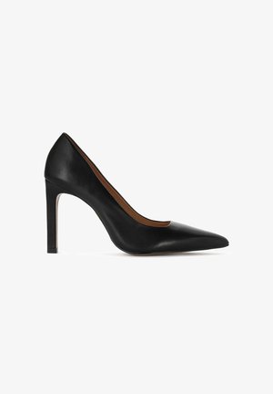 Black leather high-heeled pump with a pointed toe and a slim heel. Smooth texture with a classic silhouette and minimal detailing.
