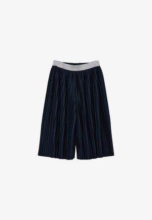 Granatowe plisowane culottes o szerokich nogawkach z srebrnym elastycznym paskiem, pokazane na białym tle.