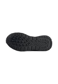 Suela de zapato de goma negra con una superficie texturizada que presenta varios patrones, incluyendo puntos elevados y surcos en zigzag para una mejor tracción.