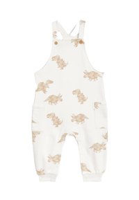 Weißer Overall mit einem Dinosaurier-Muster in Hellbraun, aus weichem Stoff gefertigt. Er hat verstellbare Träger und vordere Taschen.