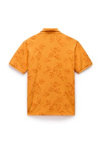 Kortærmet polo-shirt i orange med et subtilt bladmønster i mørkere nuancer. Lavet af blødt, letvægtsstof med en klassisk krave.