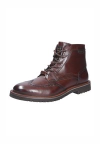 Bruine leren enkelboot met veters, brogue-details op de teen, rubberen zool en een schacht van gemiddelde hoogte. Kenmerkt zich door een prominent merklabel.