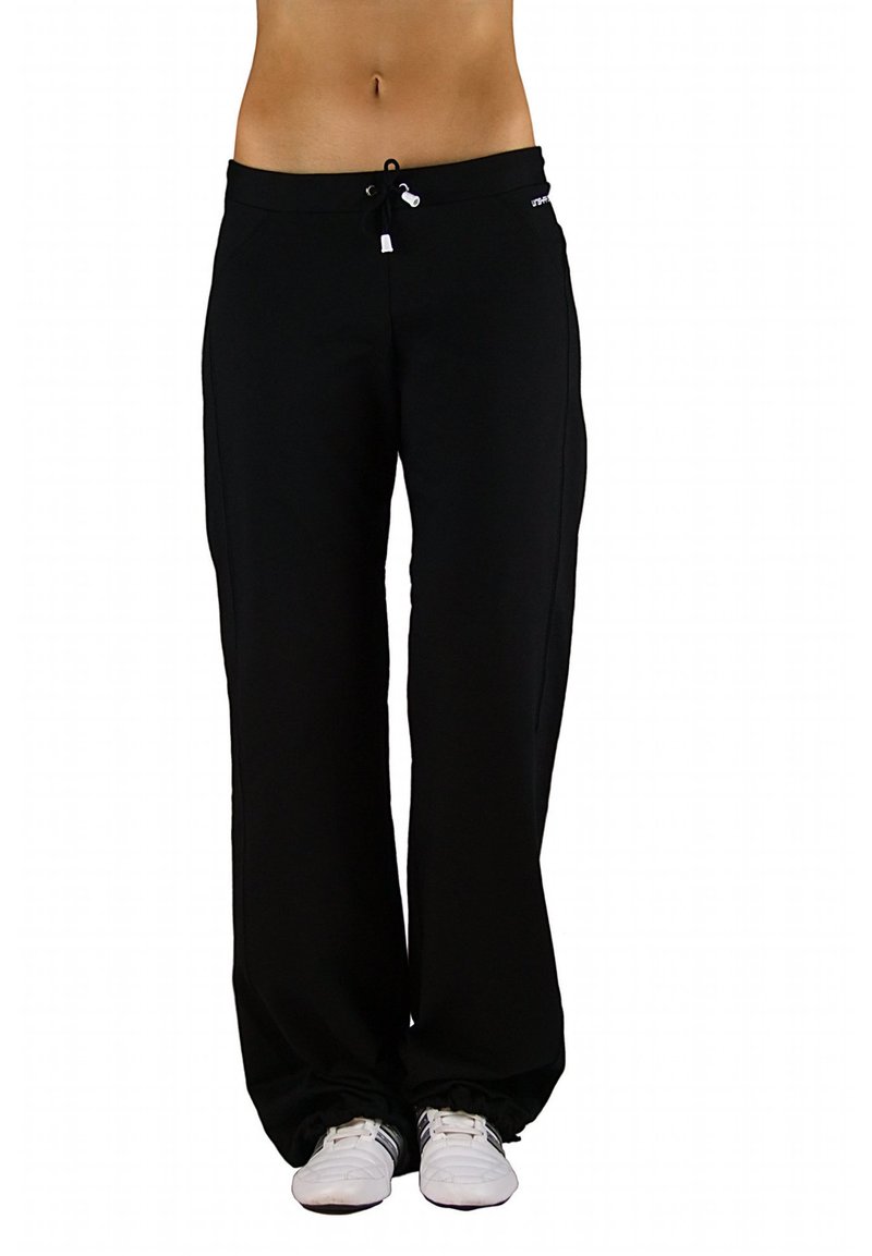 Black sweatpants with a drawstring waist, straight legs, and side pockets. Paired with white athletic shoes. Smooth, soft texture.