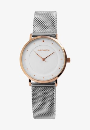 Silver mesh band watch with a rose gold-tone case, circular white dial, gold hour markers, and slender hands. Brand name: Just Watch.