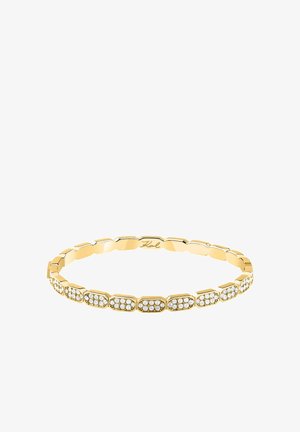 Bracciale in metallo color oro con maglie esagonali incastonate di cristalli trasparenti, che creano un design geometrico e testurizzato.