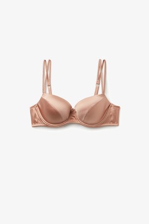 Gepolsterter BH aus weichem Satinstoff, in Blush-Farbe, mit Bügelstütze und verstellbaren geflochtenen Trägern. Glatte Oberfläche mit dezenten Nähten.