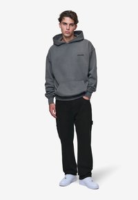 Pegador DAULE BAGGY - Baggy Jeans - deep black