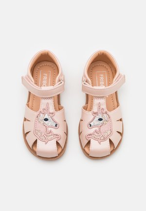 Children's light pink sandals with unicorn embroidery on front straps and adjustable Velcro closures, viewed from above on a white background.