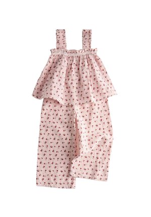Pink ærmeløs blomster-top med flæse-remme og matchende vidde bukser med små røde blomster og lodrette striber.