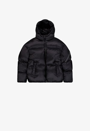 Black puffer jacket with a detachable hood, zip closure, two front pockets, and a zippered sleeve pocket. Textured, insulated material.