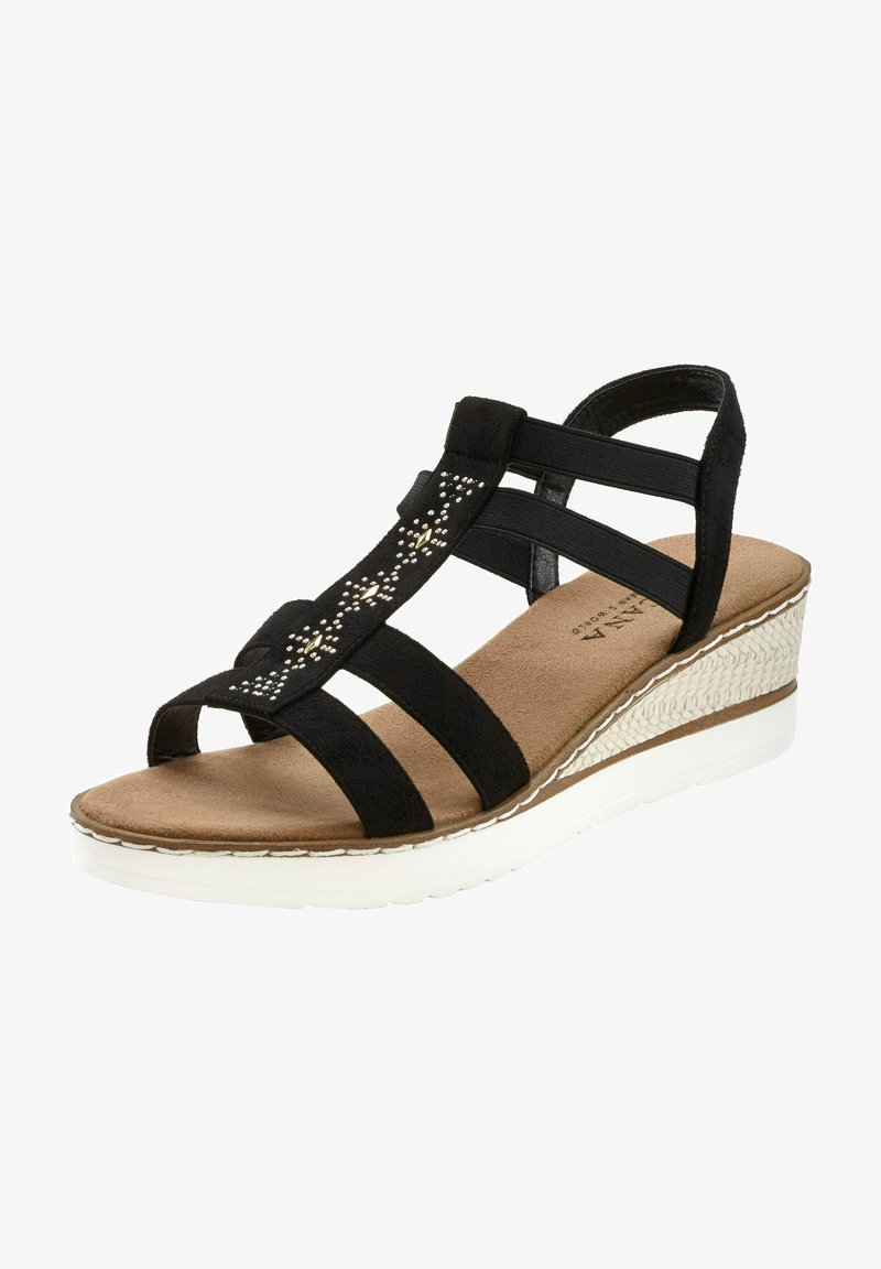 Black suede wedge sandal with multiple straps and jewel accents. Features a cushioned footbed and white rubber sole with textured details.