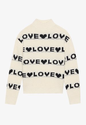 Krem pulover iz kvačkanja s visokim ovratnikom, ki vsebuje črn napis "LOVE" in srčne motive v vodoravnih črtah po telesu in rokavih.
