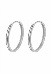 Boucles d'oreilles créoles en argent avec un design lisse et arrondi. Elles présentent une finition polie et une fermeture à charnière pour un port facile.